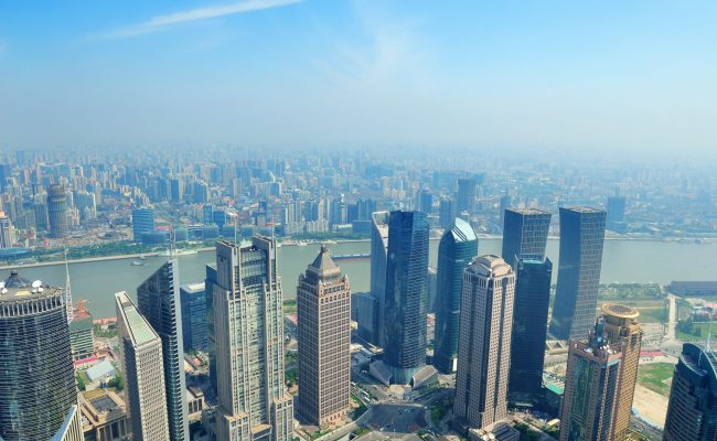 Shanghai urban city aerial view with skyscrapers.